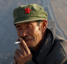 В Китае курят 300 млн