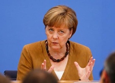 Reuters / А.Меркель